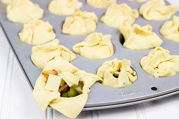 These bite-sized Sausage and Pepper Puffs are the perfect gameday appetizer!