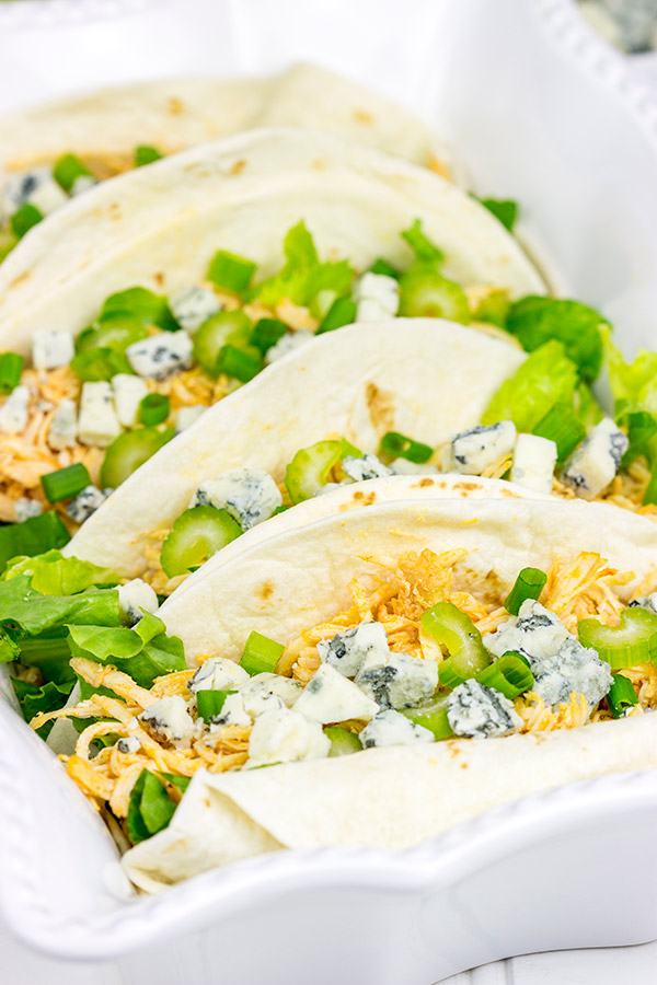 Slow Cooker Buffalo Chicken Tacos. Easy, epic football food!