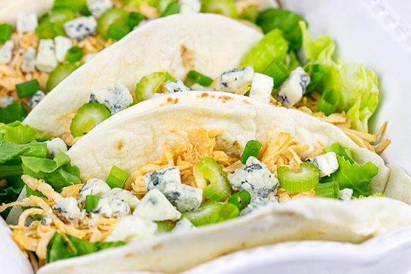 Slow Cooker Buffalo Chicken Tacos. Easy, epic football food!