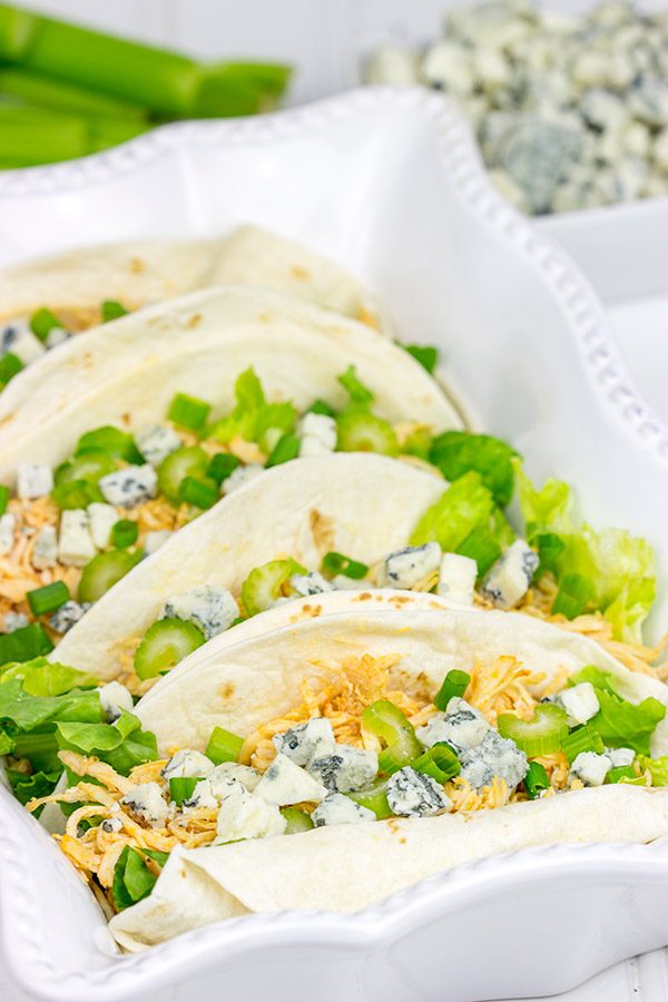 Slow Cooker Buffalo Chicken Tacos. Easy, epic football food!