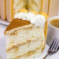 Featuring layers of white cake brushed with coffee and a hint of rum, this Tiramisu Cake is a new favorite in our house!