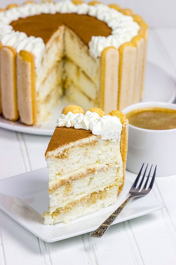 Featuring layers of white cake brushed with coffee and a hint of rum, this Tiramisu Cake is a new favorite in our house!