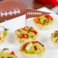 Guacamole + gameday = win! These Blackened Chicken Guacamole Bites are the perfect Super Bowl appetizer!
