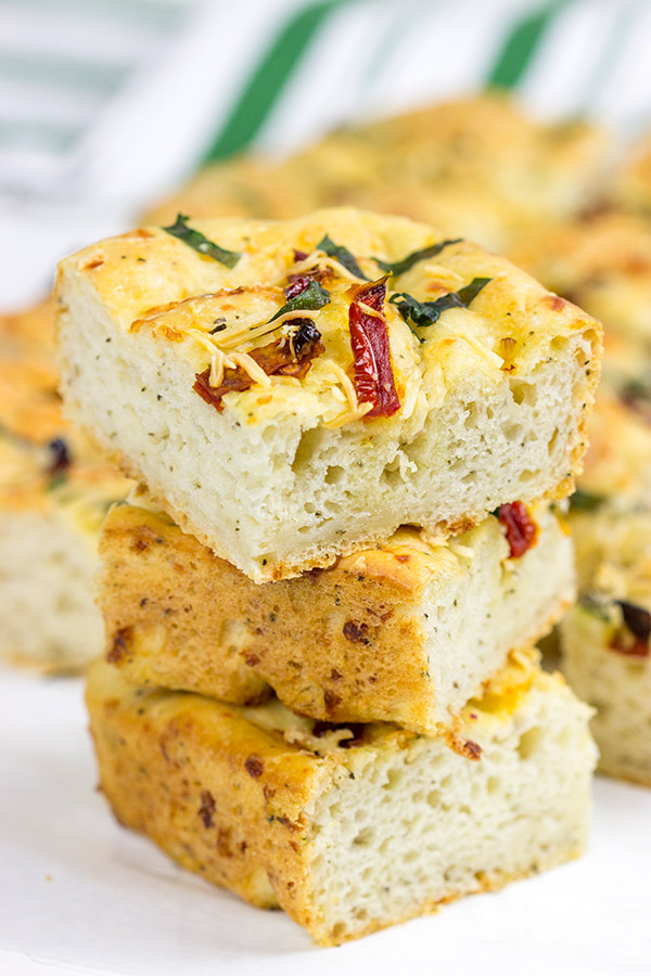 Need a unique and tasty appetizer? Give this Cheesy Spinach and Sundried Tomato Focaccia a try! (Just don't eat it all before the party...)