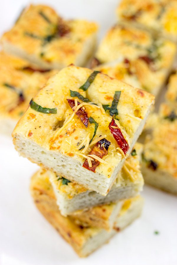Need a unique and tasty appetizer? Give this Cheesy Spinach and Sundried Tomato Focaccia a try! (Just don't eat it all before the party...)