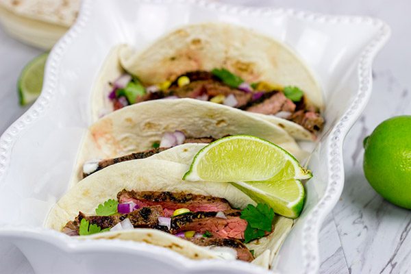 Grilled Flank Steak Tacos are an easy and delicious way to celebrate warm summer nights on the back porch!