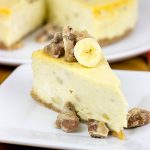 A cross between banana pudding and cheesecake, this Banana Cheesecake with Crumbled Pralines is the perfect summertime dessert!
