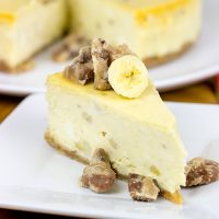 A cross between banana pudding and cheesecake, this Banana Cheesecake with Crumbled Pralines is the perfect summertime dessert!