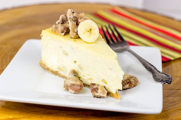 A cross between banana pudding and cheesecake, this Banana Pudding Cheesecake with Crumbled Pralines is the perfect summertime dessert!