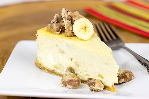 A cross between banana pudding and cheesecake, this Banana Pudding Cheesecake with Crumbled Pralines is the perfect summertime dessert!