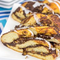 Layers of chocolate, peanut butter and soft dough are twisted together to create this tasty Chocolate Peanut Butter Twist Bread.