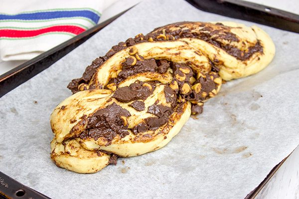 Layers of chocolate, peanut butter and soft dough are twisted together to create this tasty Chocolate Peanut Butter Twist Bread.