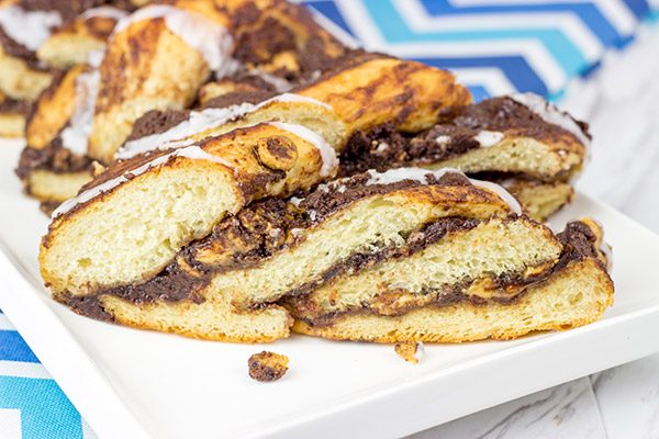 Layers of chocolate, peanut butter and soft dough are twisted together to create this tasty Chocolate Peanut Butter Twist Bread.