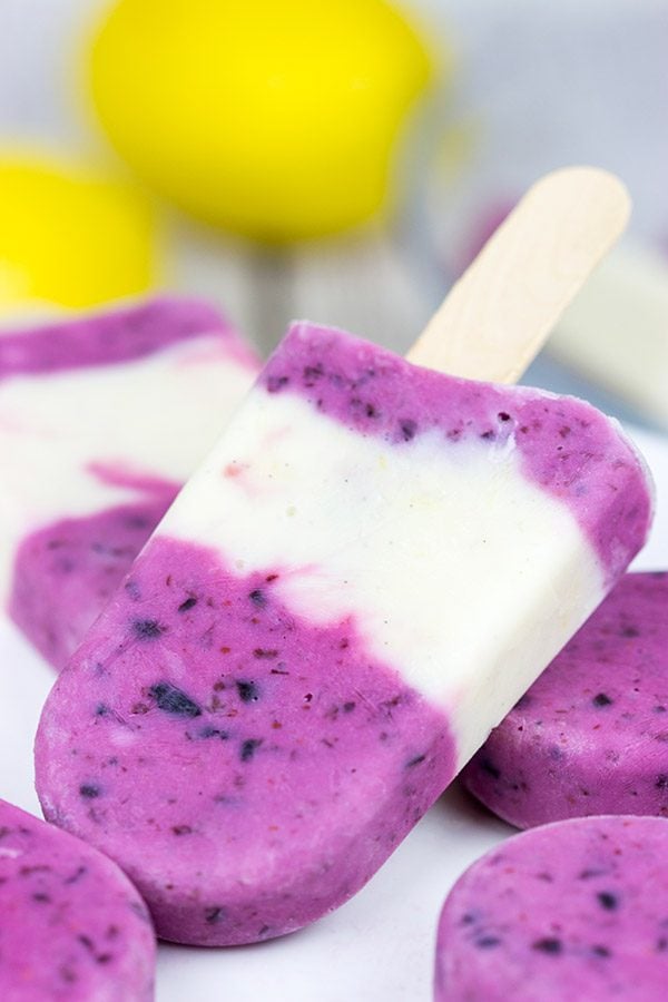 Ah, summer! Grab one of these Lemon Blueberry Popsicles and enjoy the warm sunshine in the backyard!