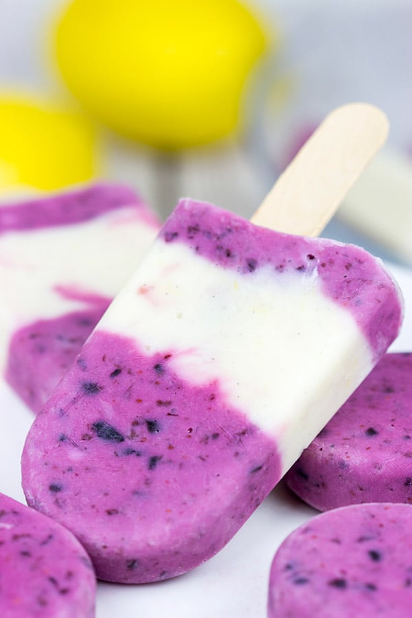 Ah, summer! Grab one of these Lemon Blueberry Popsicles and enjoy the warm sunshine in the backyard!