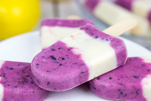 Ah, summer! Grab one of these Lemon Blueberry Popsicles and enjoy the warm sunshine in the backyard!