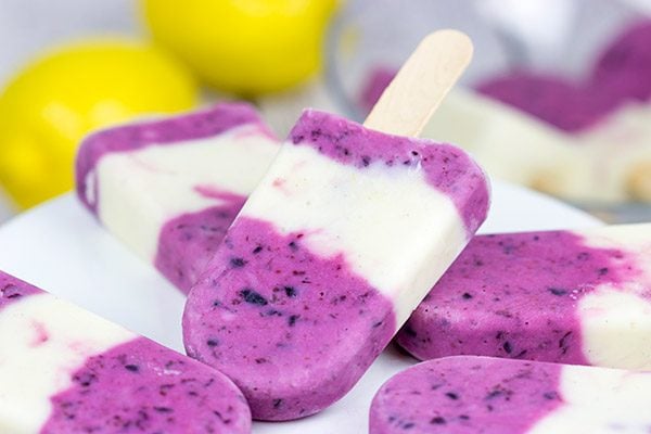 Ah, summer! Grab one of these Lemon Blueberry Popsicles and enjoy the warm sunshine in the backyard!