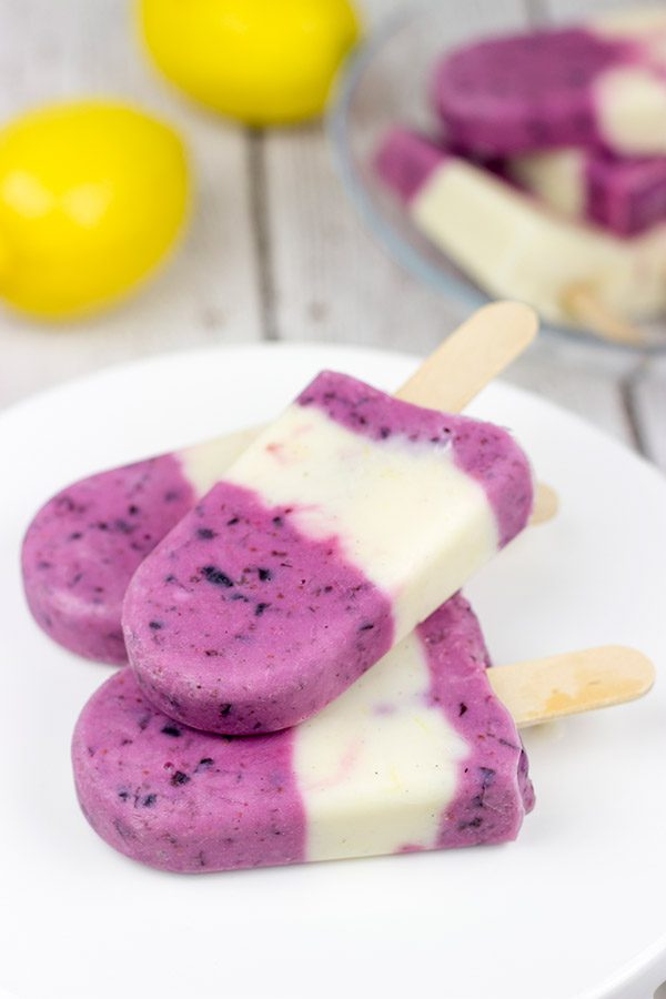 Ah, summer! Grab one of these Lemon Blueberry Popsicles and enjoy the warm sunshine in the backyard!