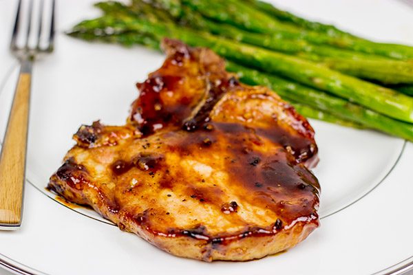 Maple Chipotle Glazed Pork Chops are an easy weeknight meal, and they're packed with delicious flavor!