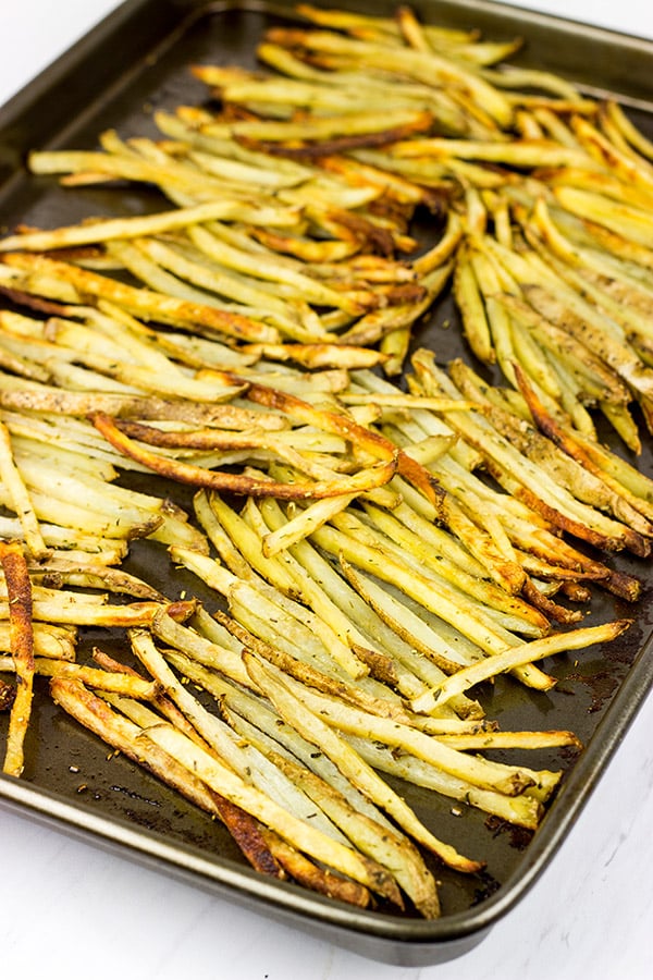 Thin-cut fries seasoned with fresh rosemary and garlic, these Rosemary Garlic Smashfries will become a favorite in your house!