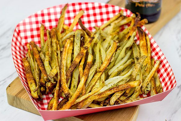 Thin-cut fries seasoned with fresh rosemary and garlic, these Rosemary Garlic Smashfries will become a favorite in your house!