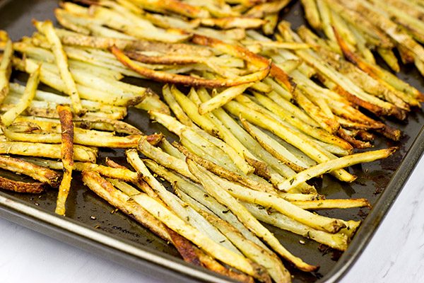 Thin-cut fries seasoned with fresh rosemary and garlic, these Rosemary Garlic Smashfries will become a favorite in your house!