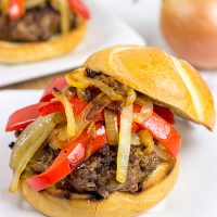 Break out the grill and serve up this Smoky Pepper and Onion Cheeseburger for dinner tonight!