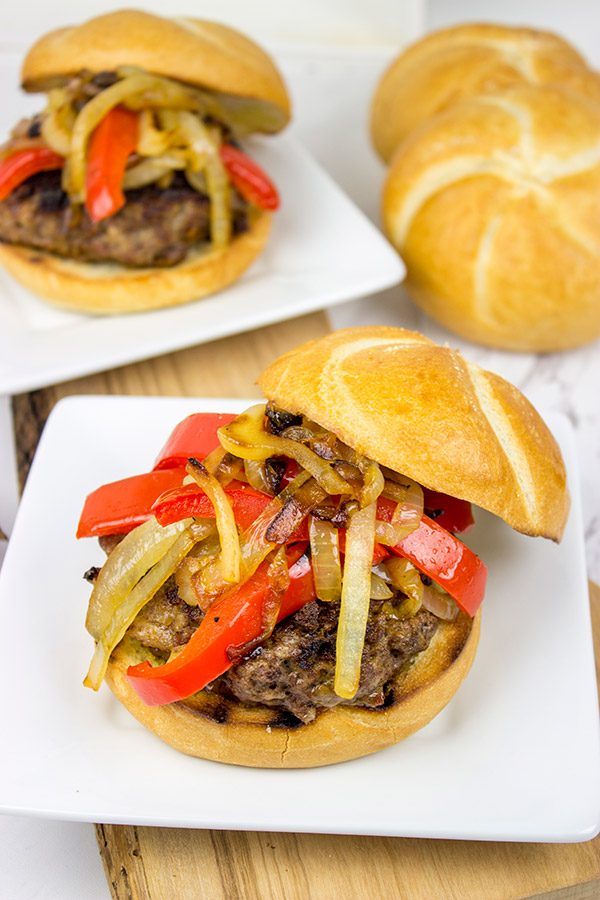 Break out the grill and serve up this Smoky Pepper and Onion Cheeseburger for dinner tonight!