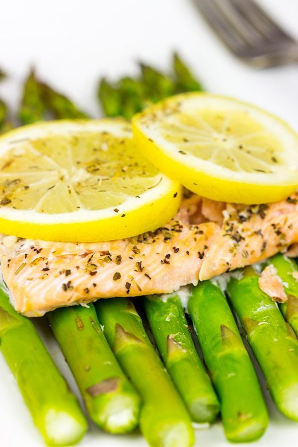 Baked all together in a foil packet, this Herbed Lemon Salmon is an easy (and healthy!) weeknight dinner idea.