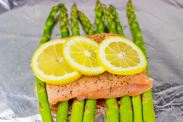 Baked all together in a foil packet, this Herbed Lemon Salmon is an easy (and healthy!) weeknight dinner idea.