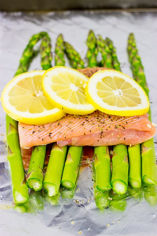 Baked all together in a foil packet, this Herbed Lemon Salmon is an easy (and healthy!) weeknight dinner idea.