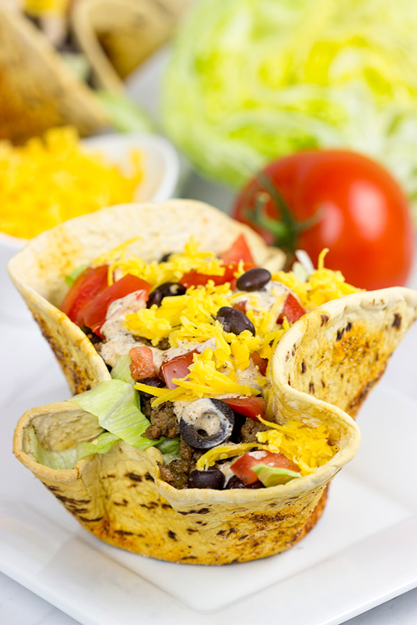 The crispy, seasoned bowls are the best part of these tasty Taco Salad Bowls!