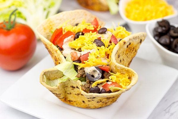 The crispy, seasoned bowls are the best part of these tasty Taco Salad Bowls!