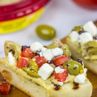 Looking for a tasty grilled appetizer? This Grilled Mediterranean Baguette is easy and delicious!