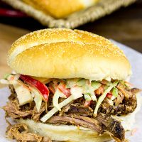 Now that the weather is turning cooler, dust off the slow cooker and whip up some of these Slow Cooker Cajun Pulled Pork Sandwiches!