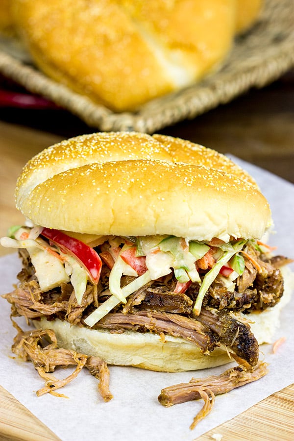 Now that the weather is turning cooler, dust off the slow cooker and whip up some of these Slow Cooker Cajun Pulled Pork Sandwiches!
