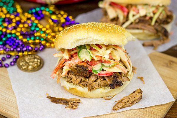 Now that the weather is turning cooler, dust off the slow cooker and whip up some of these Slow Cooker Cajun Pulled Pork Sandwiches!