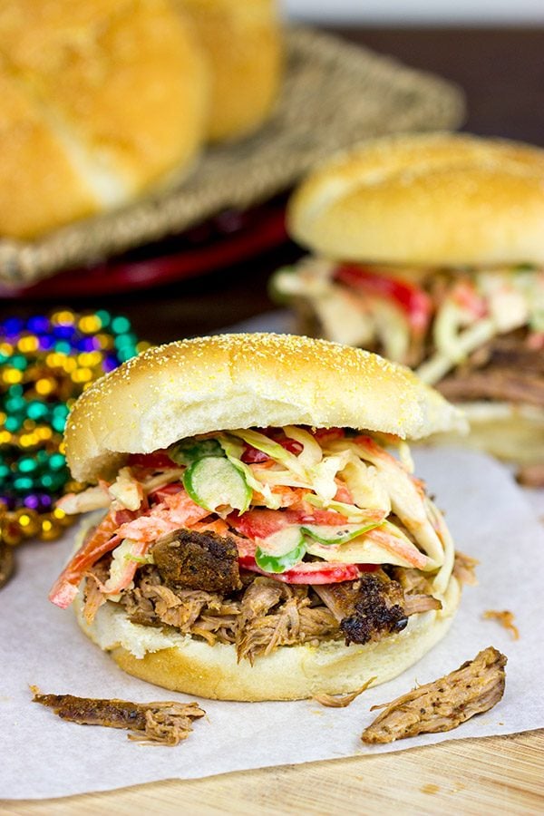 Now that the weather is turning cooler, dust off the slow cooker and whip up some of these Slow Cooker Cajun Pulled Pork Sandwiches!