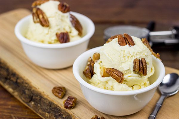 Topped with chopped, candied pecans, this Butter Pecan Ice Cream is a classic ice cream flavor!