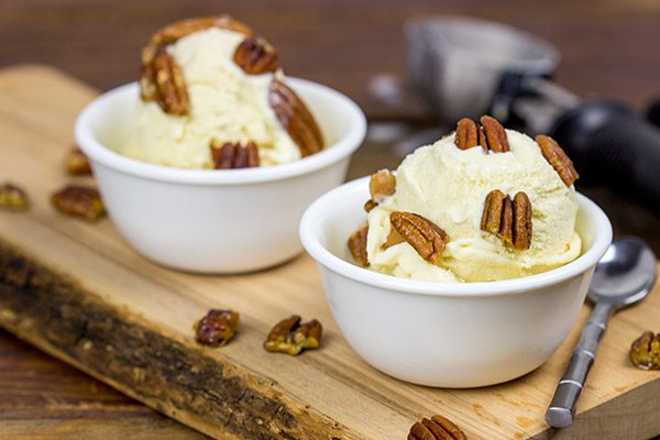 Topped with chopped, candied pecans, this Butter Pecan Ice Cream is a classic ice cream flavor!