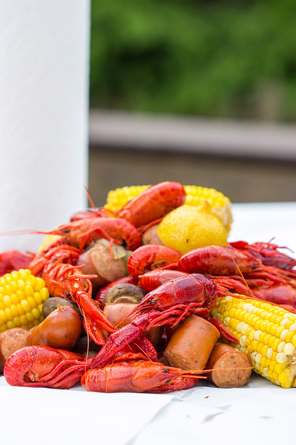 Head to the backyard this weekend and host a Cajun Crawfish Boil with friends!
