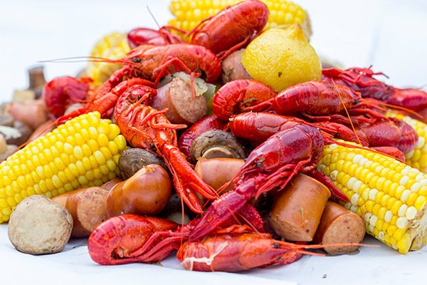 Head to the backyard this weekend and host a Cajun Crawfish Boil with friends!