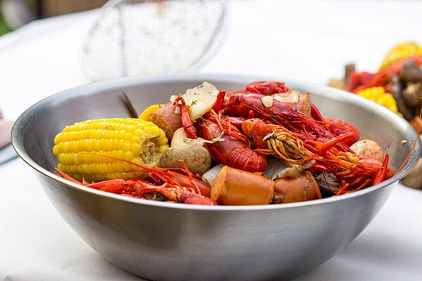 Head to the backyard this weekend and host a Cajun Crawfish Boil with friends!