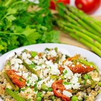 Looking for a healthy summer salad? Try roasting the tomatoes and asparagus! This Farro and Wild Rice Salad is quite tasty!