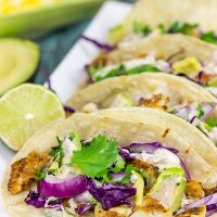 These Grilled Fish Tacos are packed with flavor...perfect for a summer dinner on the back porch!