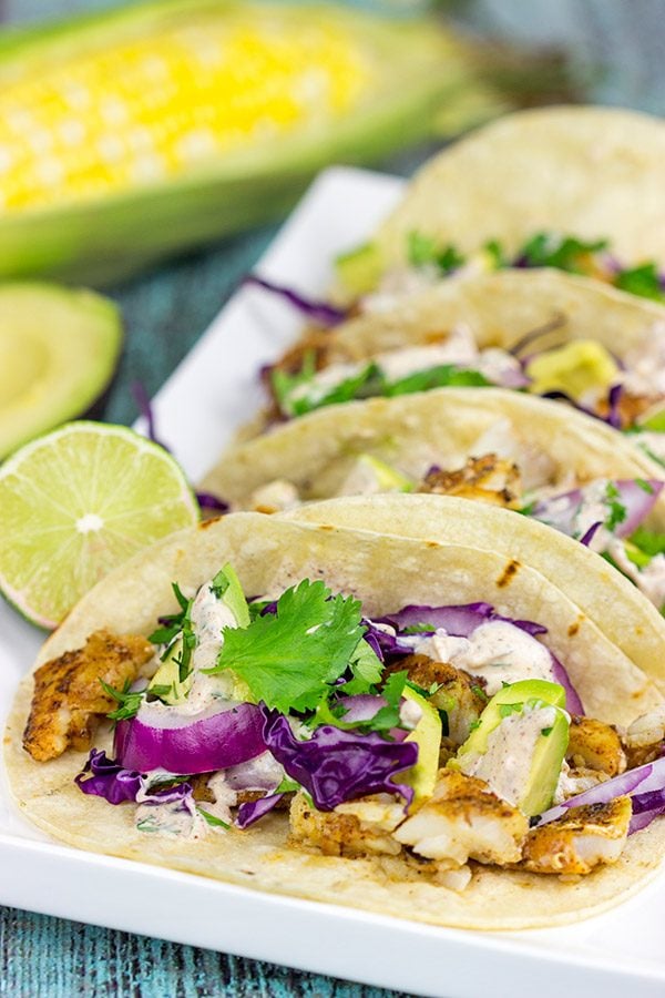 These Grilled Fish Tacos are packed with flavor...perfect for a summer dinner on the back porch!