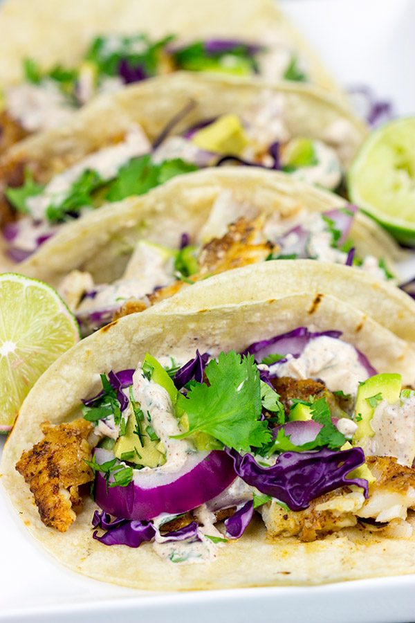 These Grilled Fish Tacos are packed with flavor...perfect for a summer dinner on the back porch!