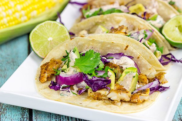 These Grilled Fish Tacos are packed with flavor...perfect for a summer dinner on the back porch!