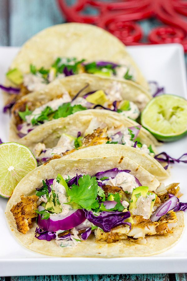 These Grilled Fish Tacos are packed with flavor...perfect for a summer dinner on the back porch!