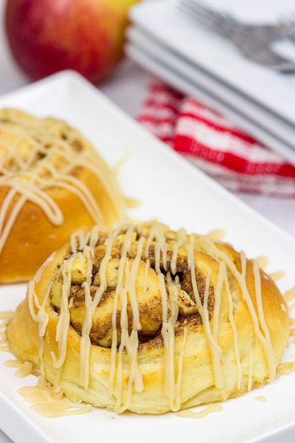 These Caramel Apple Cinnamon Rolls are the perfect way to welcome in the cooler October temperatures!
